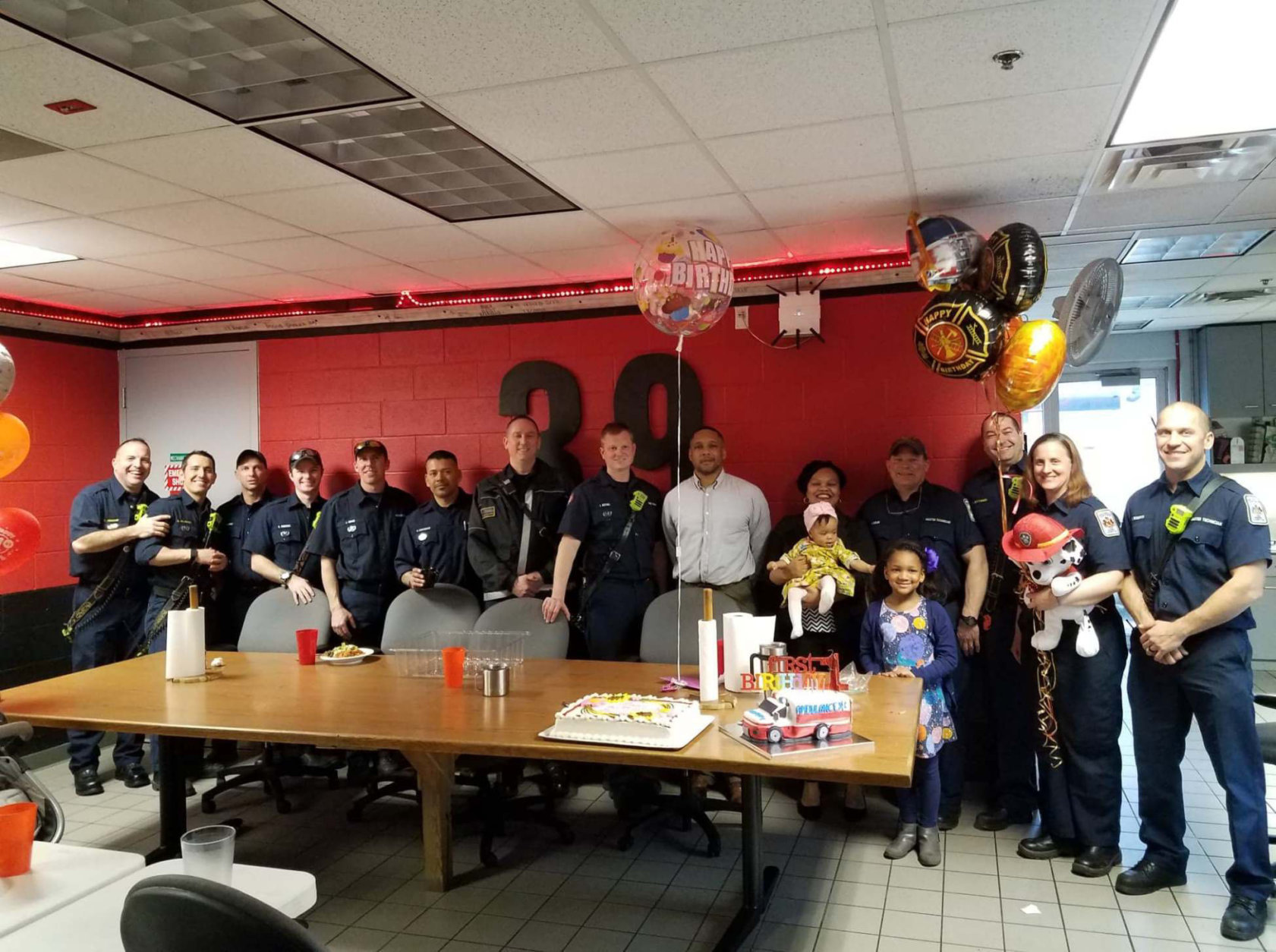 The family of baby Lauryn reached out to the firefighters from Station 39 in North Point who helped deliver her to include them in the birthday celebration. (Courtesy Fairfax County Fire and Rescue)