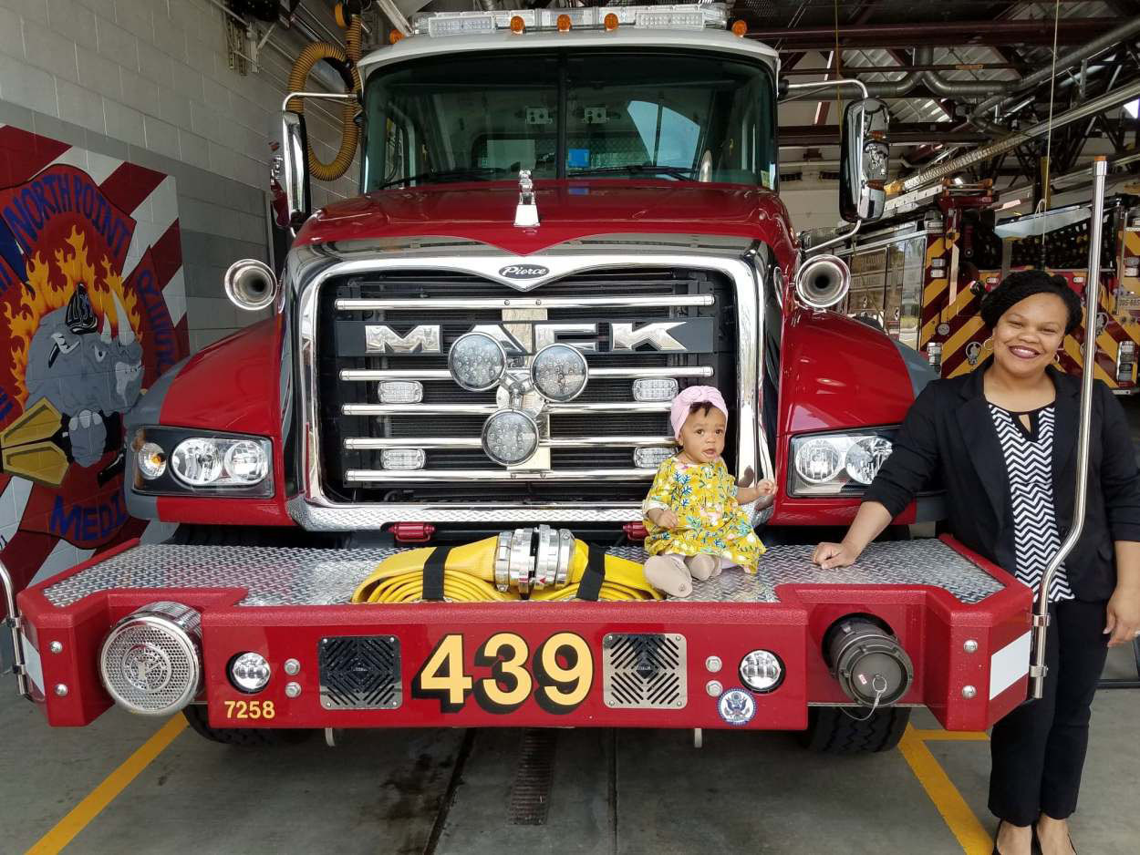 Lauryn and her mom got to pose on a fire truck. (Courtesy Fairfax County Fire and Rescue)