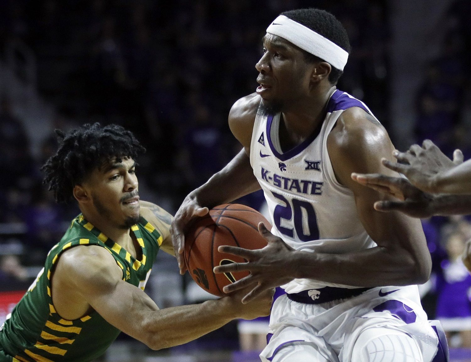 George Mason guard Otis Livingston II, left, steals the ball from Kansas State forward Xavier Sneed (20) during the second half of an NCAA college basketball game in Manhattan, Kan., Saturday, Dec. 29, 2018. (AP Photo/Orlin Wagner)