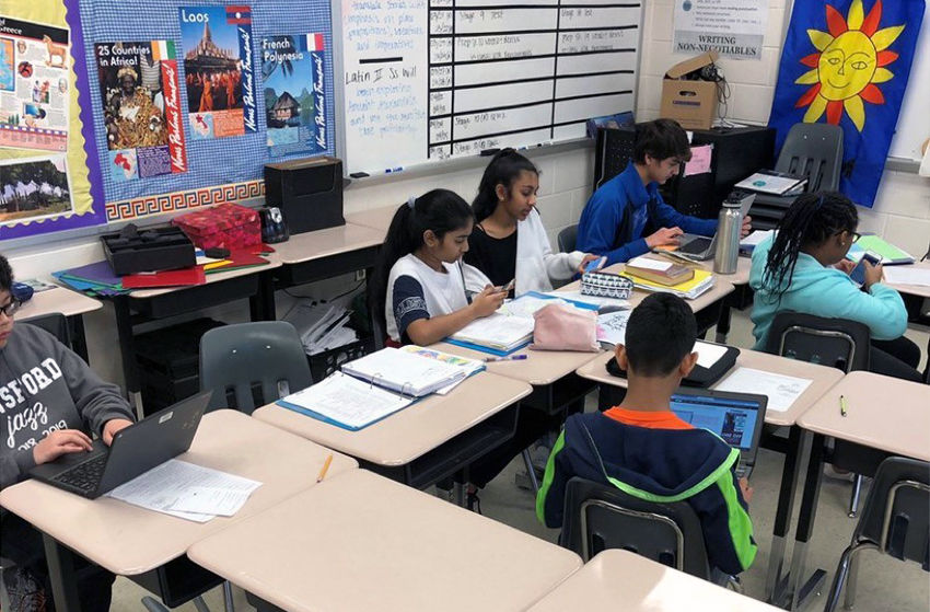 Students at J. Michael Lunsford Middle School work on a class assignment. (Courtesy Carrie Simms)