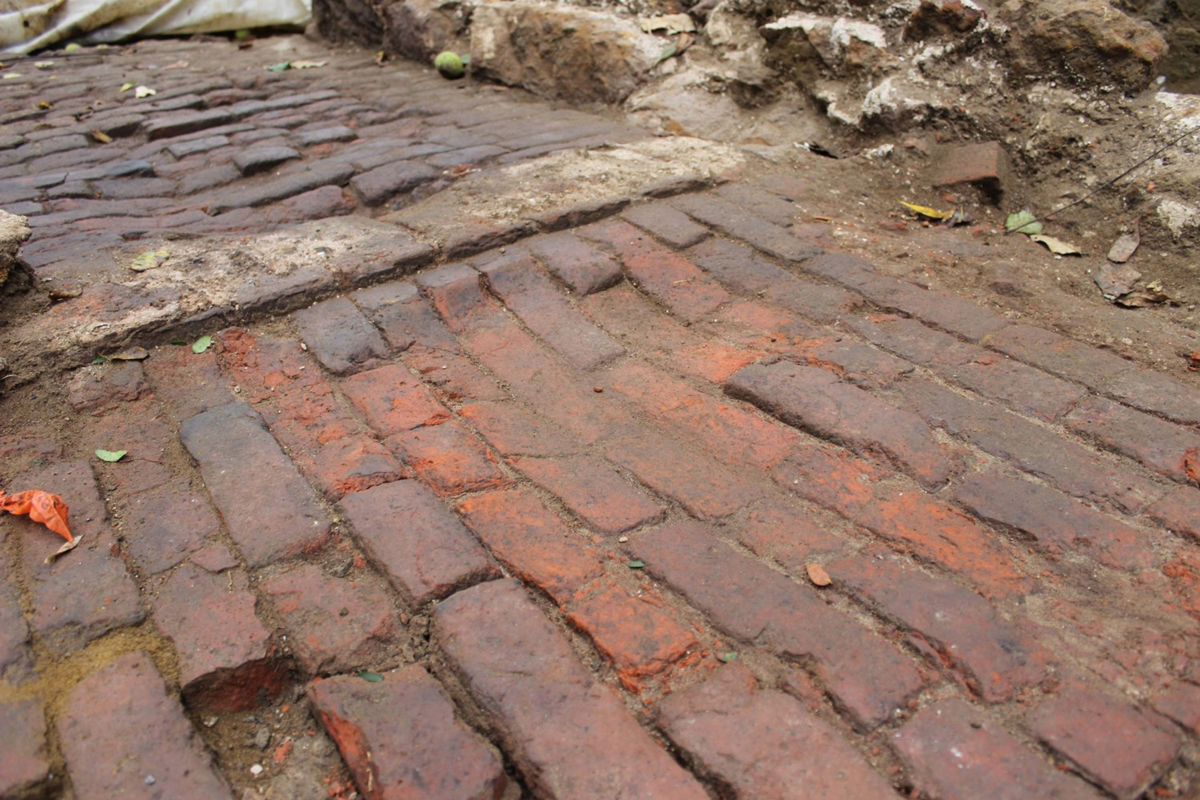 A brick floor at the Belvoir site that shows wear from people walking on it over the years. (Courtesy MDOT SHA)