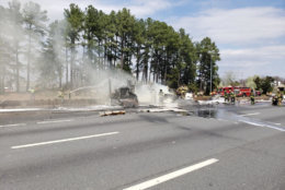 Fire crews extinguish Thursday afternoon's fire on the Capital Beltway in Virginia. (Courtesy Virginia State Police)