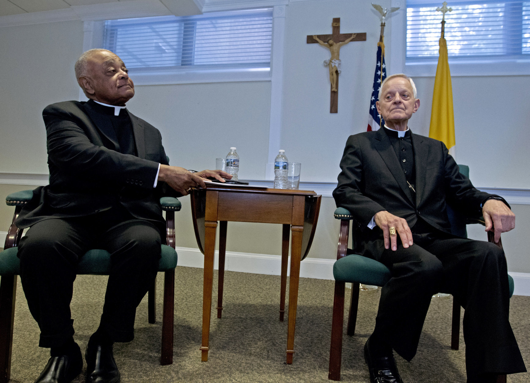 Archbishop designated by Pope Francis to the Archdiocese of Washington, Archbishop Wilton D. Gregory, left, and Cardinal Donald Wuerl, during the news conference at Washington Archdiocesan Pastoral Center in Hyattsville, Md., Thursday, April 4, 2019. Archbishop-designate Gregory will succeed Cardinal Donald Wuerl. (AP Photo/Jose Luis Magana)