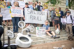 Protesters in front of the Wilson Building at Friday afternoon's demonstration for safe streets. (Courtesy Aimee Custis/Aimee Custis Photography)