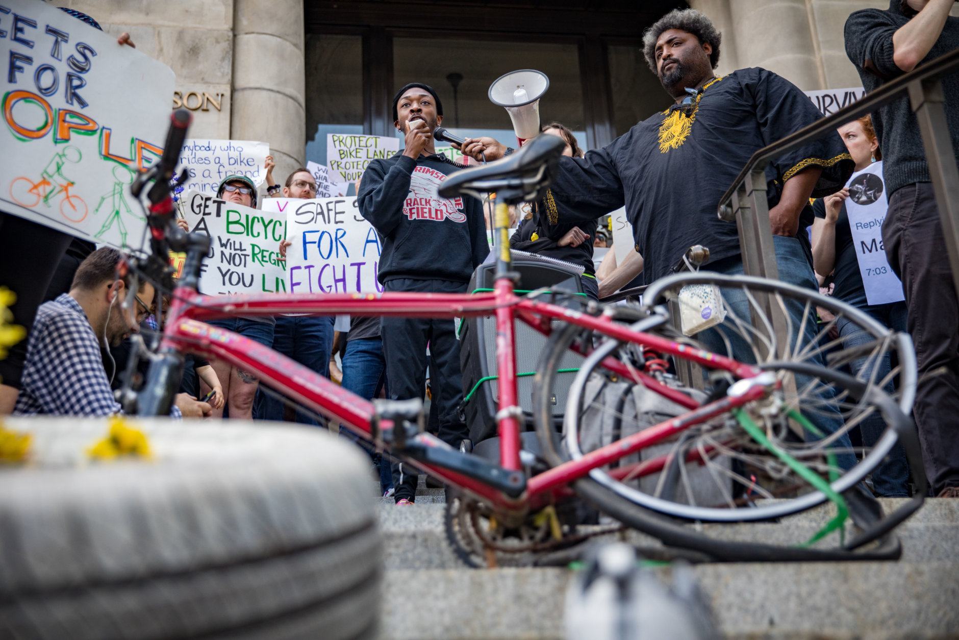 Families attend the protest for safer streets in DC outside the Wilson Building on Friday. The protest was sparked by recent deaths including that of Abdul Seck in SE DC and Dave Salovesh in NE D.C. (Courtesy Aimee Custis/Aimee Custis Photography)