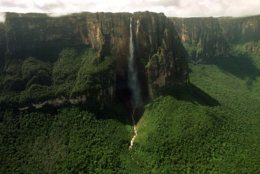 The worlds highest waterfall Angel Falls, locally known as Parekupa-meru, 15 times taller than Niagara Falls at 3,212 feet, is seen in Canaima National Park, Venezuela, Jan. 13, 2004. The mesas inspired Sir Arthur Conan Doyle's novel, "The Lost World," in which dinosaurs live on an isolated plateau in the Amazon. (AP Photo/Leslie Mazoch)