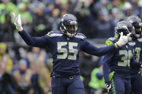 AP source: Chiefs get Clark from Seahawks for draft picks