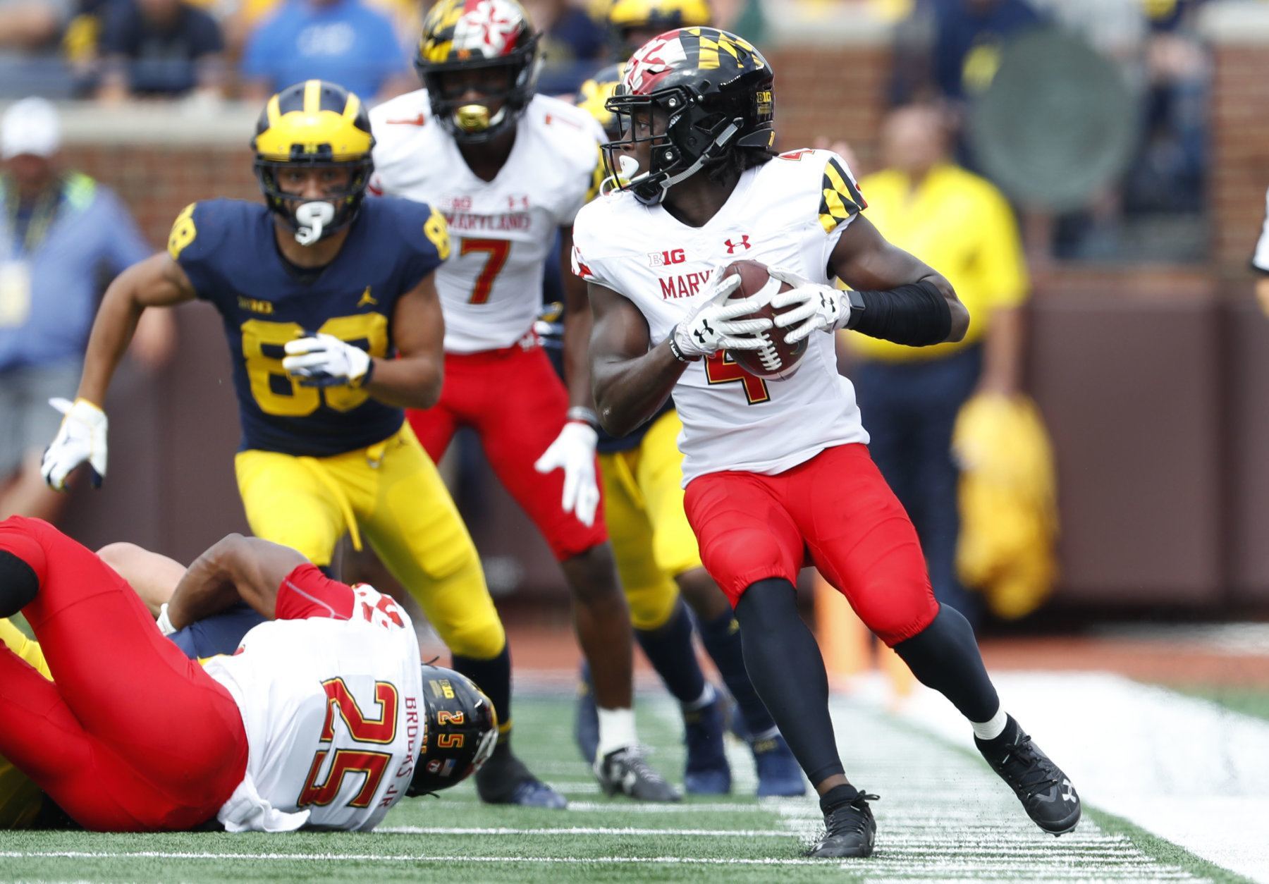 Maryland defensive back Darnell Savage Jr. (4) intercepts a Michigan pass in the first half of an NCAA football game in Ann Arbor, Mich., Saturday, Oct. 6, 2018. (AP Photo/Paul Sancya)