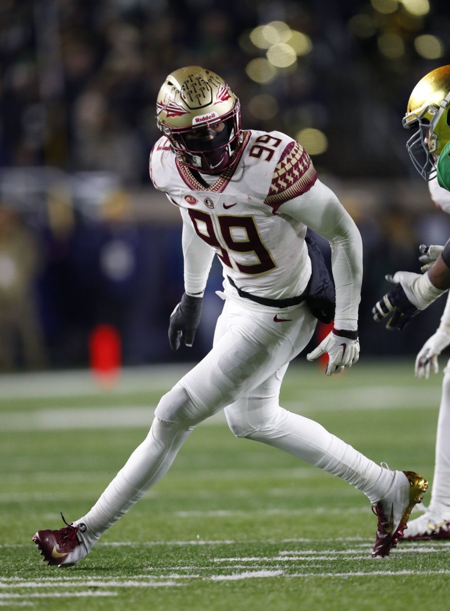 FILE - In this Nov. 10, 2018, file photo, Florida State defensive end Brian Burns plays against Notre Dame in the second half of an NCAA college football game, in South Bend, Ind. Florida State's Brian Burns, Boston College's Wyatt Ray and Syracuse's Alton Robinson are tied for eighth in sacks with nine each. (AP Photo/Paul Sancya, File)
