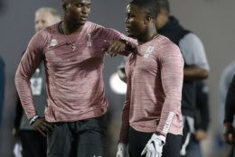 Ohio State quarterback Dwayne Haskins, left, talks with wide receiver Terry McLaurin during NFL Pro Day at Ohio State University in Columbus, Ohio, Wednesday, March 20, 2019. (AP Photo/Paul Vernon)