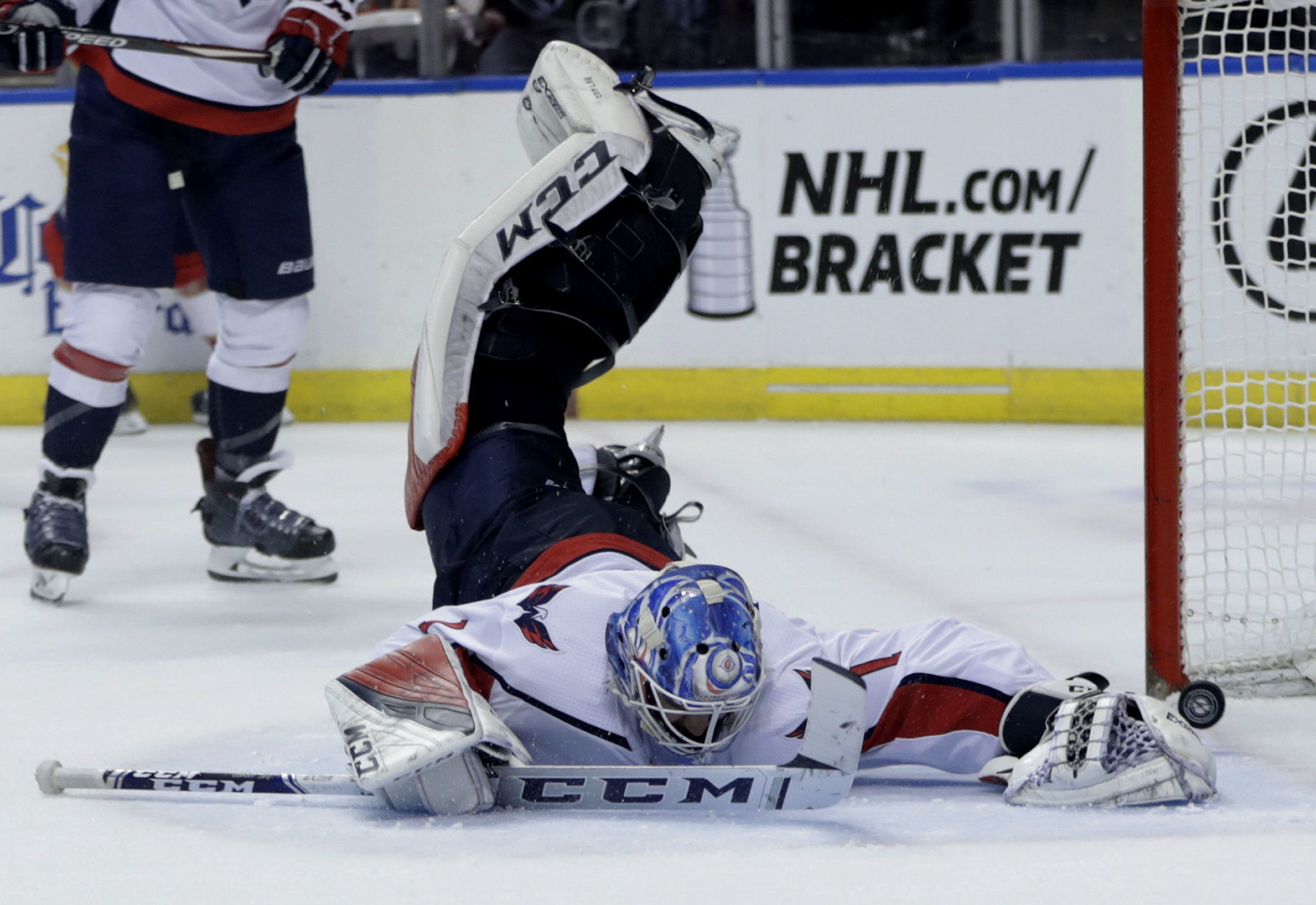 The puck gets past Washington Capitals goaltender Pheonix Copley for a goal scored by Florida Panthers right wing Troy Brouwer during the second period of an NHL hockey game, Monday, April 1, 2019, in Sunrise, Fla. (AP Photo/Lynne Sladky)