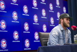 Philadelphia Phillies' Bryce Harper pauses while speaking during a news conference before a baseball game against the Washington Nationals at Nationals Park, Tuesday, April 2, 2019, in Washington. (AP Photo/Alex Brandon)