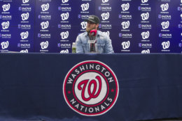 Philadelphia Phillies' Bryce Harper pauses while speaking during a news conference before a baseball game against the Washington Nationals at Nationals Park, Tuesday, April 2, 2019, in Washington. (AP Photo/Alex Brandon)