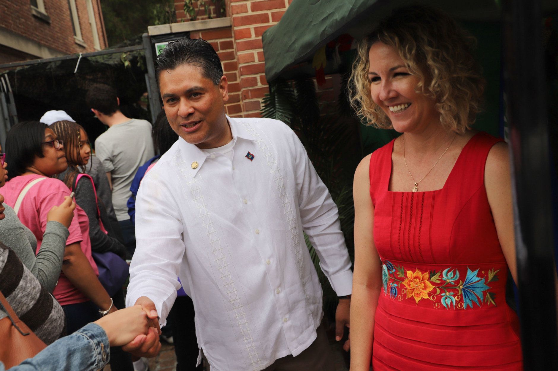 Belizean Ambassador Daniel Gutierez and his wife, Erin Ryan, greet visitors at last year's Around the World Embassy Tour. (Courtesy Cultural Tourism DC)