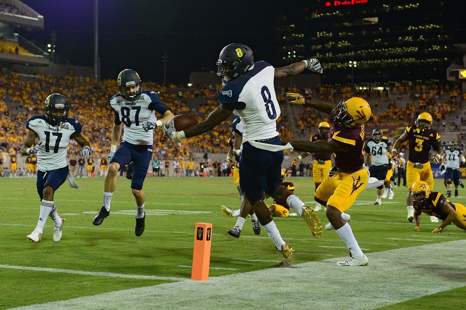 TEMPE, AZ - SEPTEMBER 03:  Wide receiver Emmanuel Butler #8 of the Northern Arizona Lumberjacks is forced out of bounds by defensive back De'Chavon Hayes #8 of the Arizona State Sun Devils in the first half of the game at Sun Devil Stadium on September 3, 2016 in Tempe, Arizona. The Arizona State Sun Devils won 44-13. (Photo by Jennifer Stewart/Getty Images)