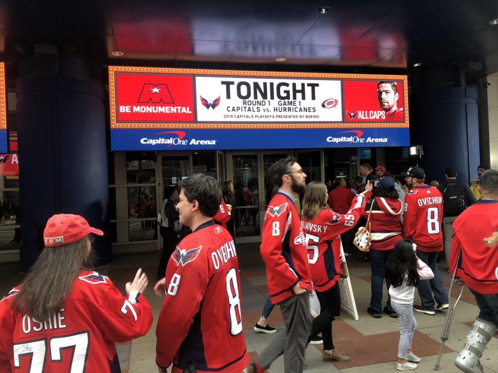 Caps fans get ready to head in to Capital One Arena ahead of game one against the Carolina Hurricanes. (WTOP/Mike Murillo)