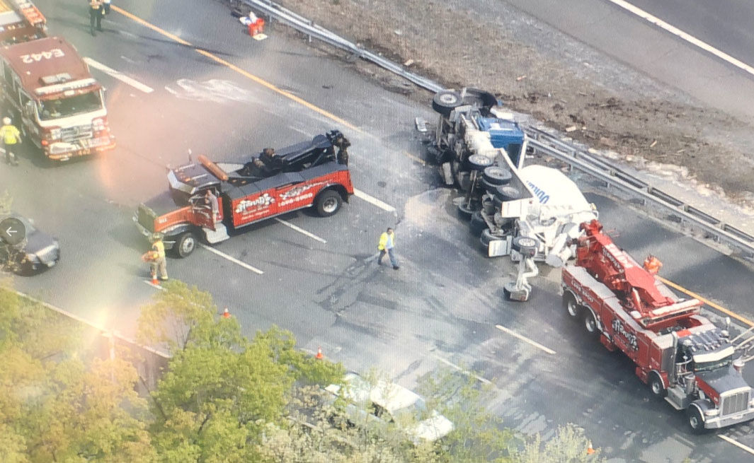 An overturned truck on Va. 267/Dulles Toll Road just after Route 7 in Vienna, Virginia, caused significant delays starting Wednesday afternoon. (NBC Washington/Brad Freitas)