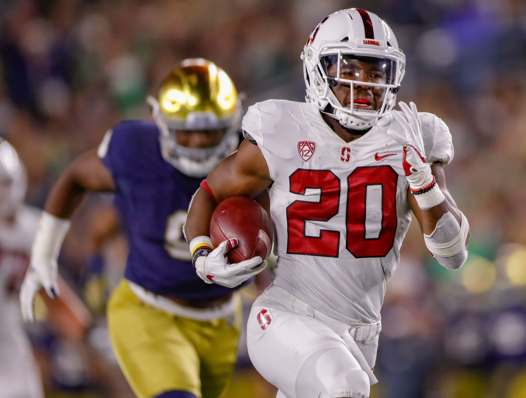 SOUTH BEND, IN - SEPTEMBER 29: Bryce Love #20 of the Stanford Cardinal runs for a touchdown during the game against the Notre Dame Fighting Irish at Notre Dame Stadium on September 29, 2018 in South Bend, Indiana. (Photo by Michael Hickey/Getty Images)