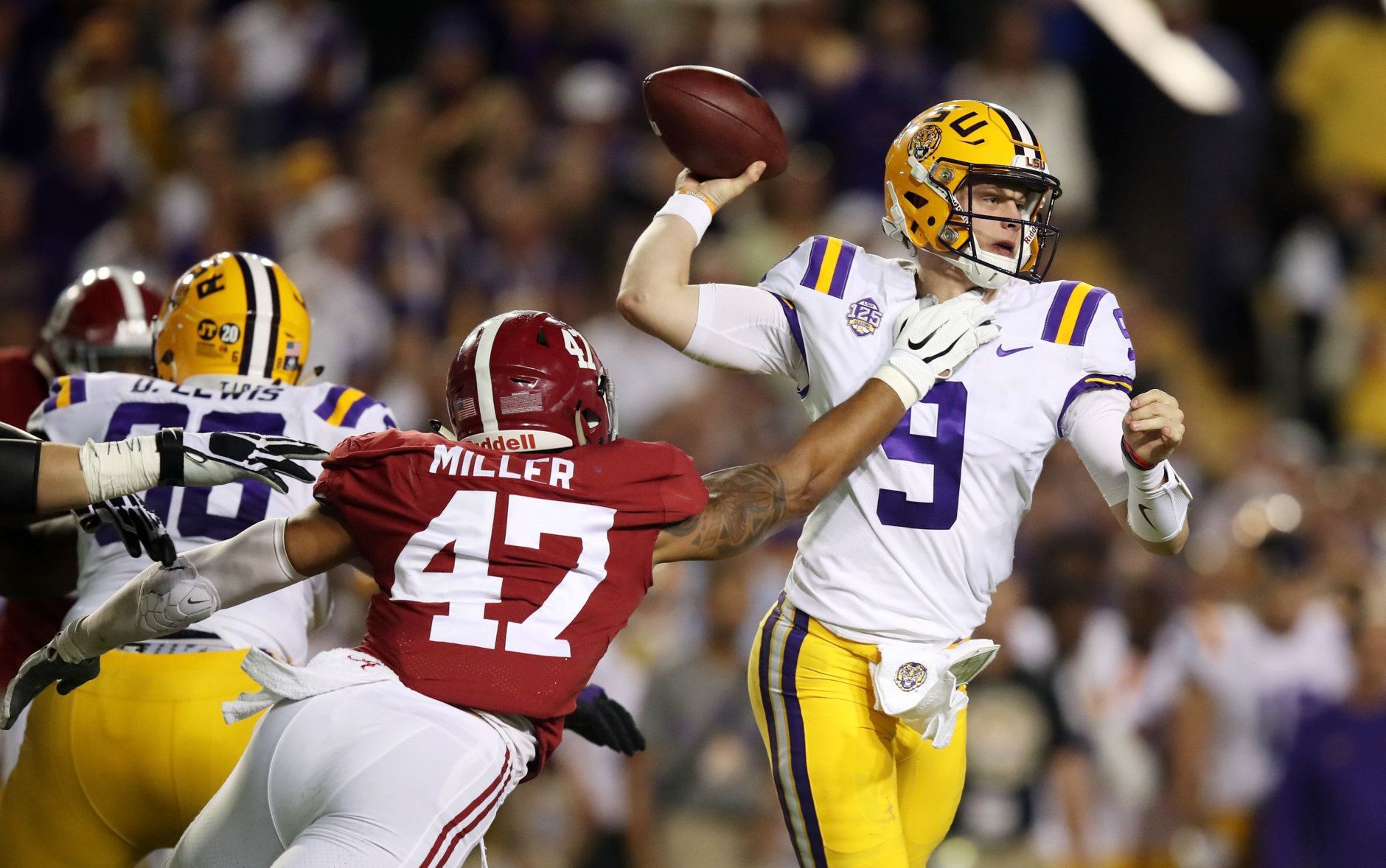 BATON ROUGE, LOUISIANA - NOVEMBER 03: Christian Miller #47 of the Alabama Crimson Tide attempts to sack Joe Burrow #9 of the LSU Tigers in the second quarter of their game at Tiger Stadium on November 03, 2018 in Baton Rouge, Louisiana. (Photo by Gregory Shamus/Getty Images)