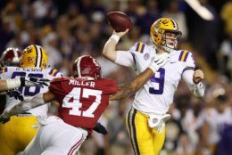 BATON ROUGE, LOUISIANA - NOVEMBER 03: Christian Miller #47 of the Alabama Crimson Tide attempts to sack Joe Burrow #9 of the LSU Tigers in the second quarter of their game at Tiger Stadium on November 03, 2018 in Baton Rouge, Louisiana. (Photo by Gregory Shamus/Getty Images)