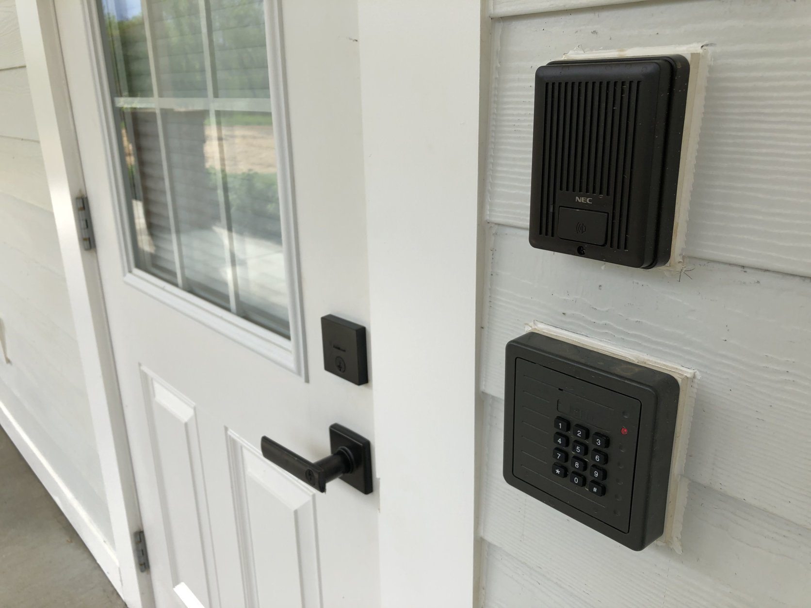 Accessibility-focused features including lower door handles will make it more convenient for people in or out of wheelchairs to navigate the home. (WTOP/Neal Augenstein)