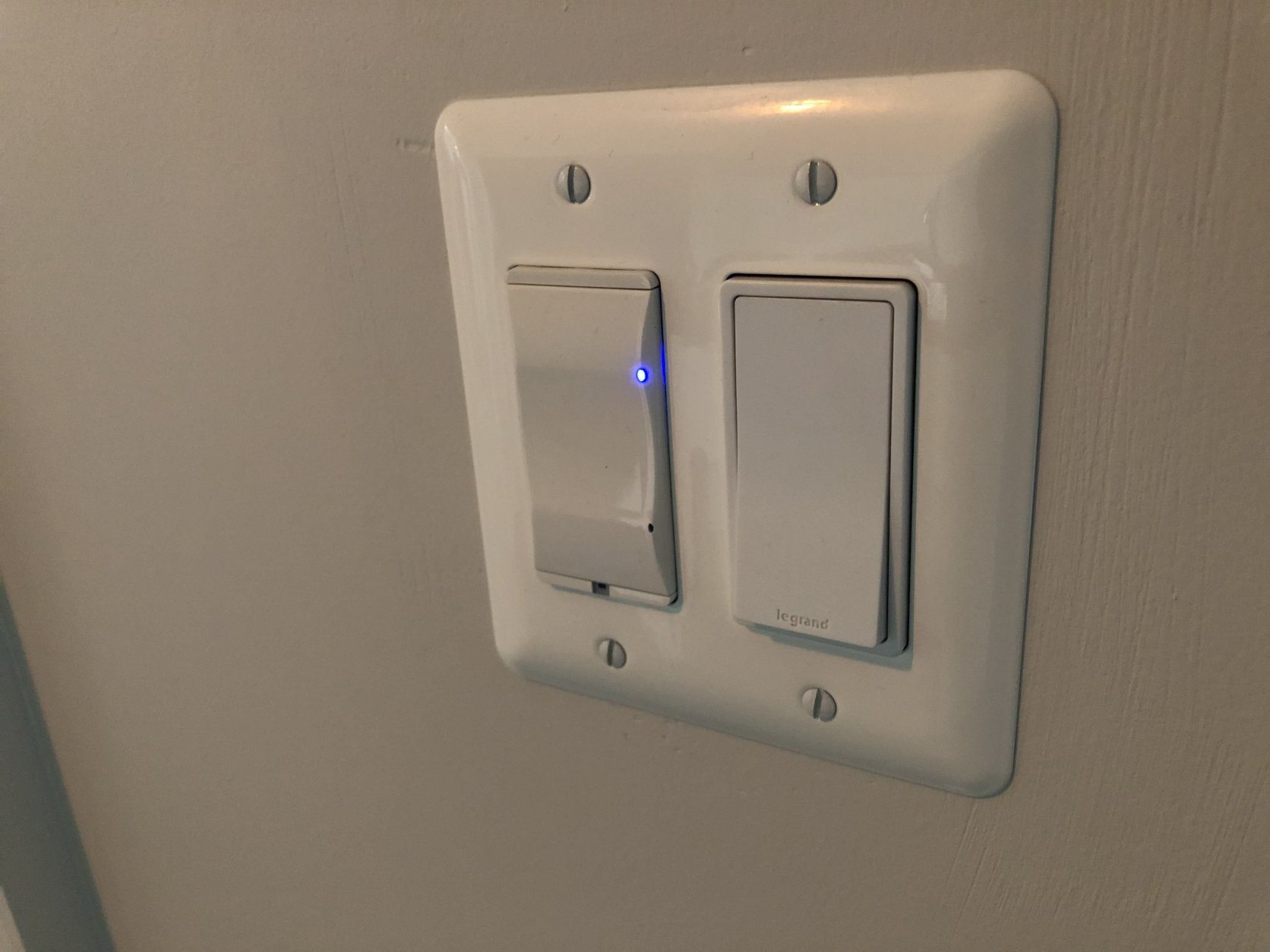 Motion detectors enable light switches to turn on and doors to close when Rob Jones enters a room in his new home. (WTOP/Neal Augenstein)
