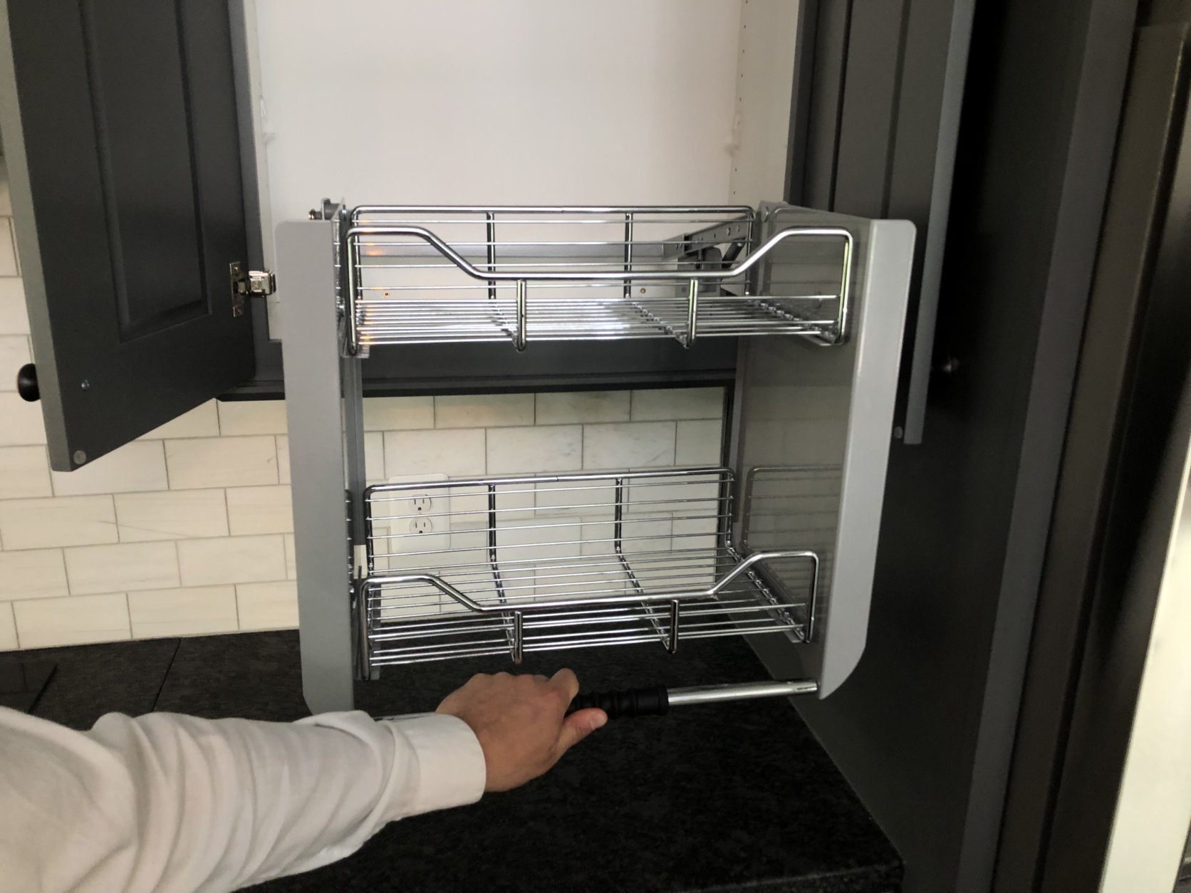 Racks slide out of cabinets for easy accessibility. (WTOP/Neal Augenstein)