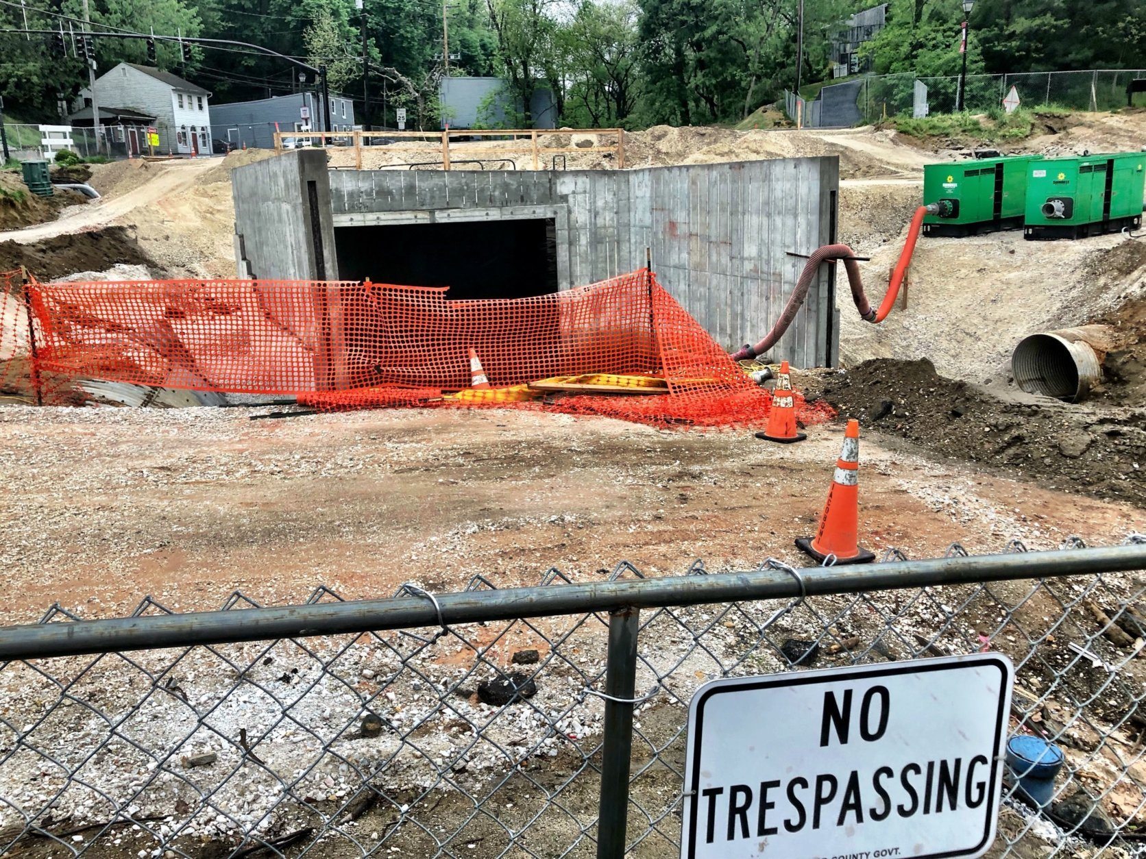 Howard County has built a concrete culvert that's 24 feet wide by 13 feet high  and repaved the portion of Ellicott Mills Drive that was washed away in May 2018. (WTOP/Neal Augenstein)
