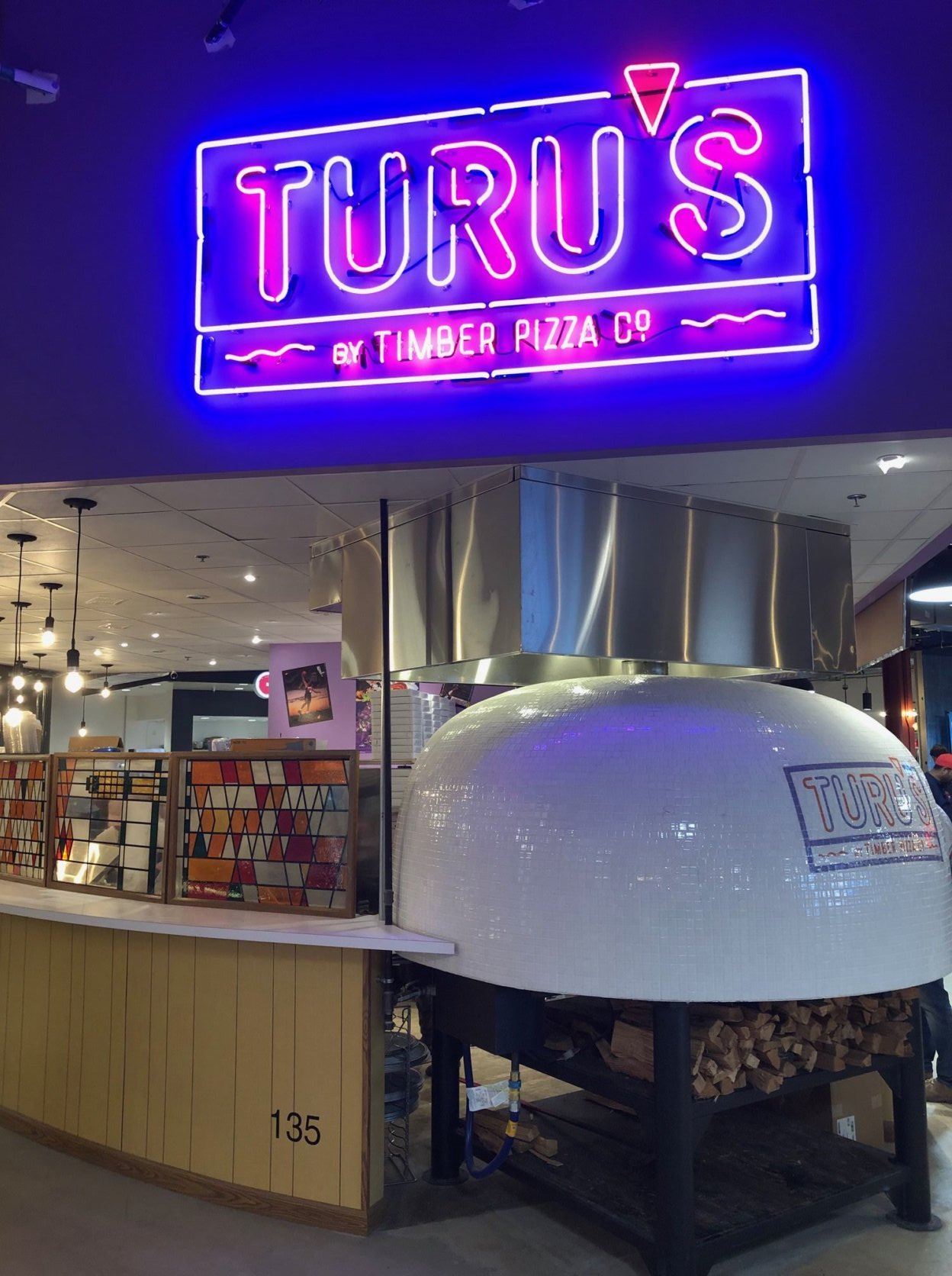 The team behind Timber Pizza Co. is firing up New York-style slices in the wood oven of its new outpost, Turu’s. (WTOP/Rachel Nania) 

