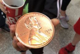 One child in the elephant house joked that he would use this penny to buy an elephant he would name "Tiny." (WTOP/Kristi King)