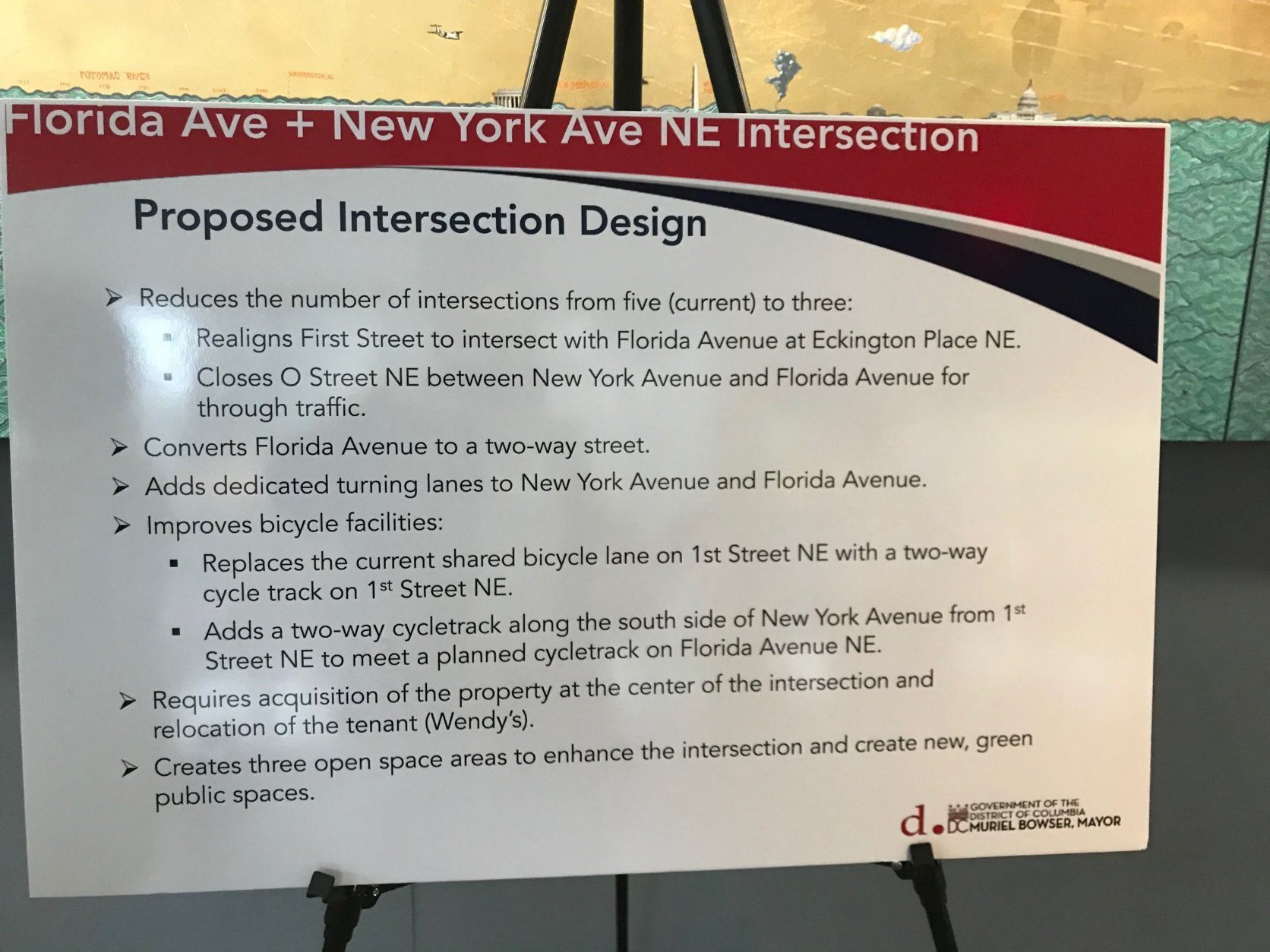 A DDOT poster explains the proposed changes to Dave Thomas Circle. (WTOP/Dick Uliano)