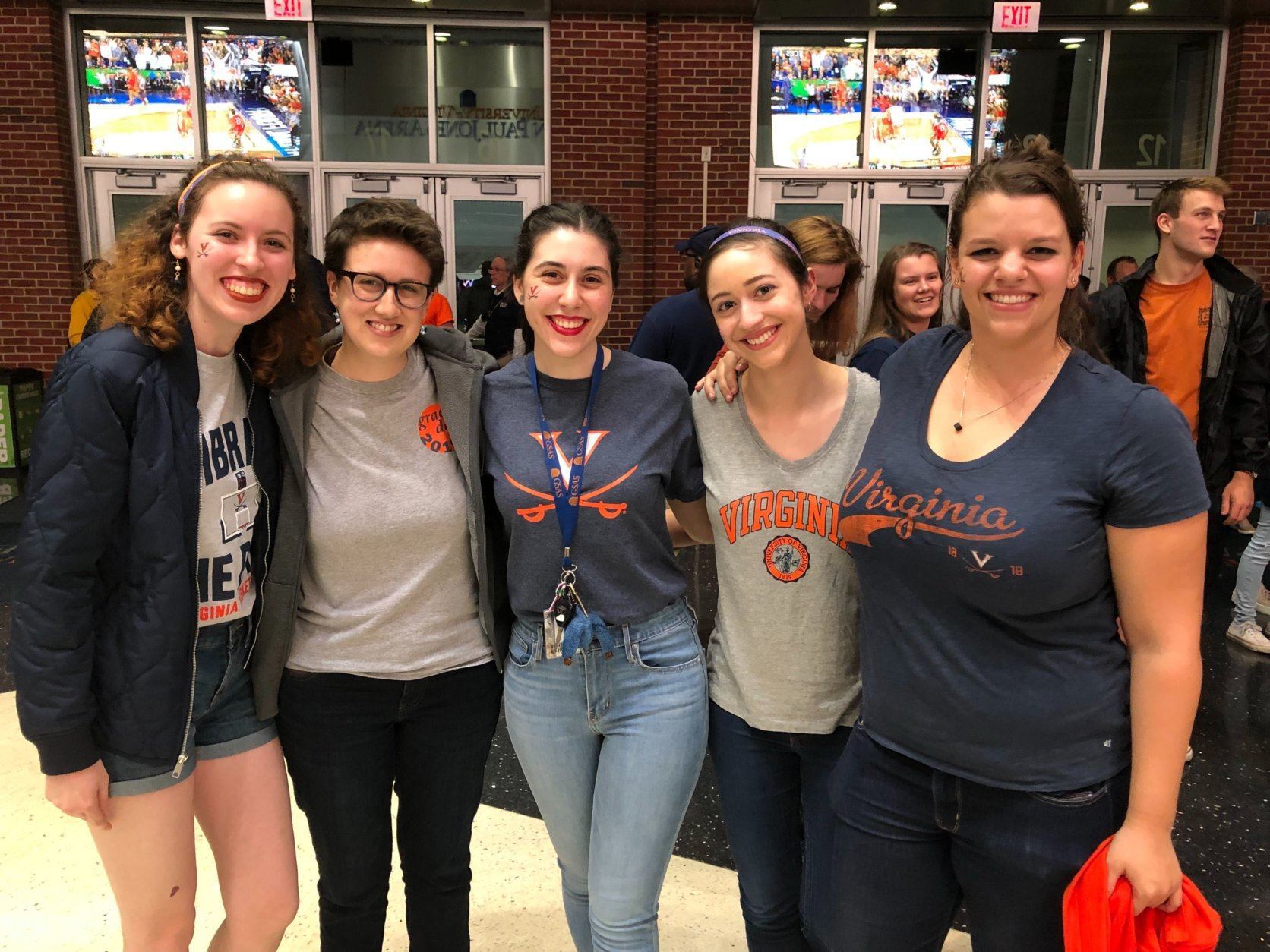 U.Va graduate students studying to be Spanish teachers. One described anxiously sitting on the edge of her seat during the game. Another said she was pumping her fist so strongly in the air, she became concerned she’d throw her phone. (WTOP/Kristi King)