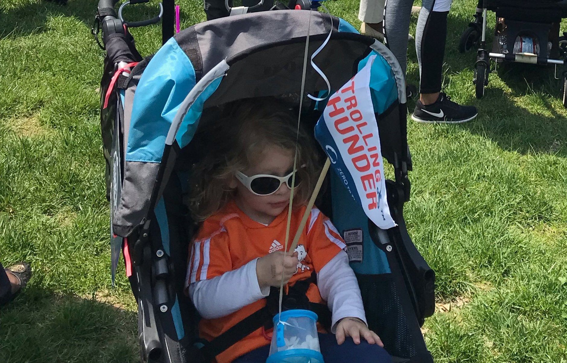 Cecily Colburn, 3, was among those who came in a stroller to the Capitol. Her father Casey says he and his wife Rochelle, a Hill staffer, were never able to get the congressional day care that’s offered. They were too low on a waiting list. (WTOP/Mitchell Miller)