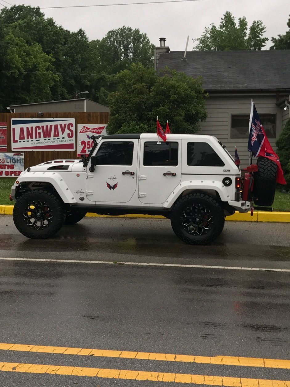 The Famous Caps Jeep riding around town. (Courtesy Ed Twomey) 