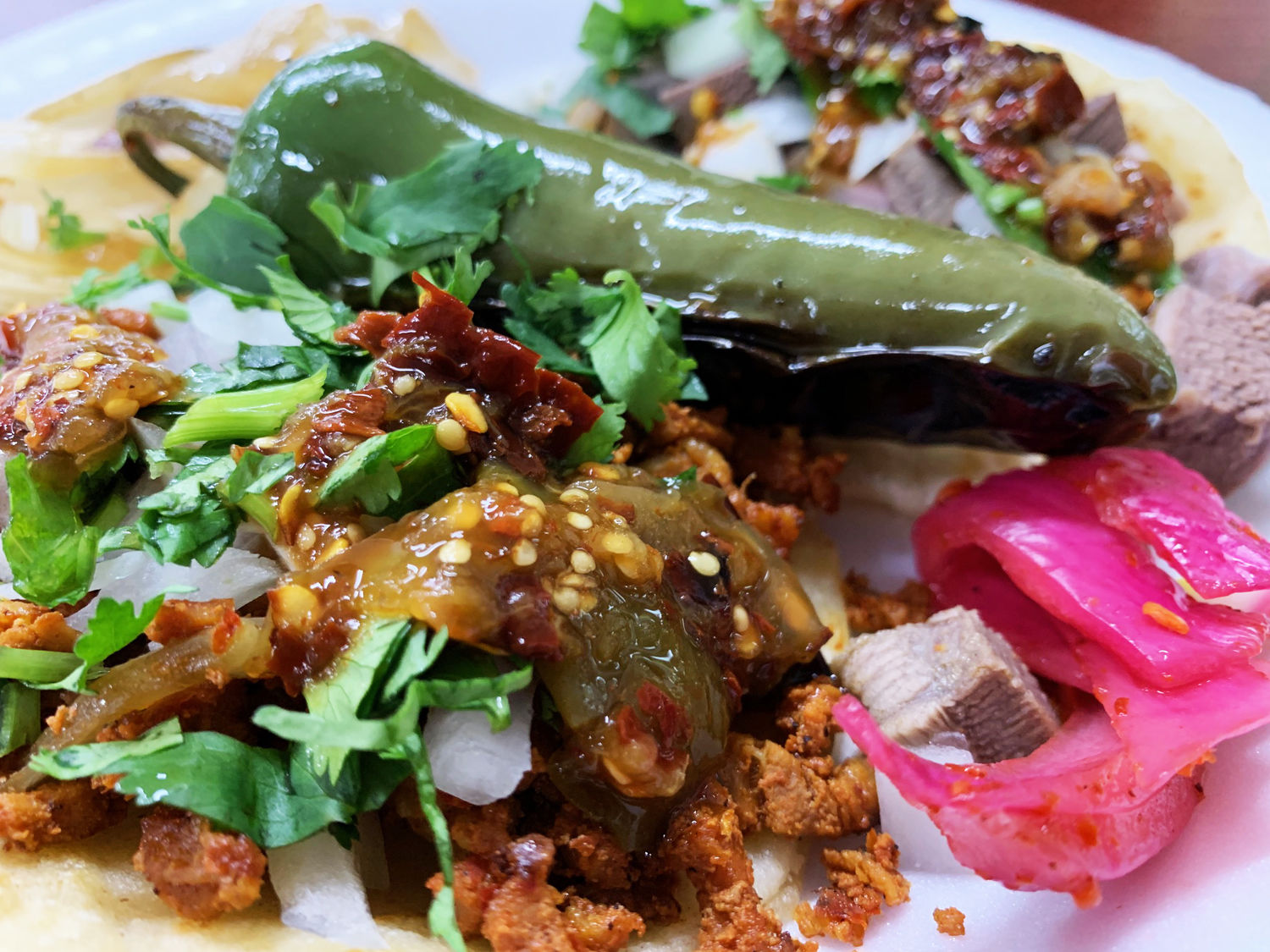Al pastor and lengua tacos from Taqueria Pancho in West Fresno. (WTOP/Noah Frank)