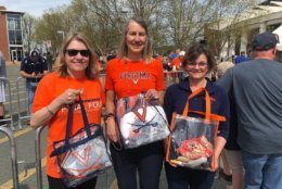 Rocking the clear bag needed to go into John Paul Jones Arena are Lori O’Toole of Richmond, Virginia, and Jeanne Landis and Vickie Sandifer of Lynchburg, Virginia. UVA’s win: “is something be proud of.” (WTOP/Kristi King)