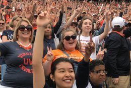 Fans gather at Scott Stadium in Charlottesville, Virginia, on Saturday, April 13, 2019, for a celebration for the men's basketball team. (WTOP/Michelle Basch)