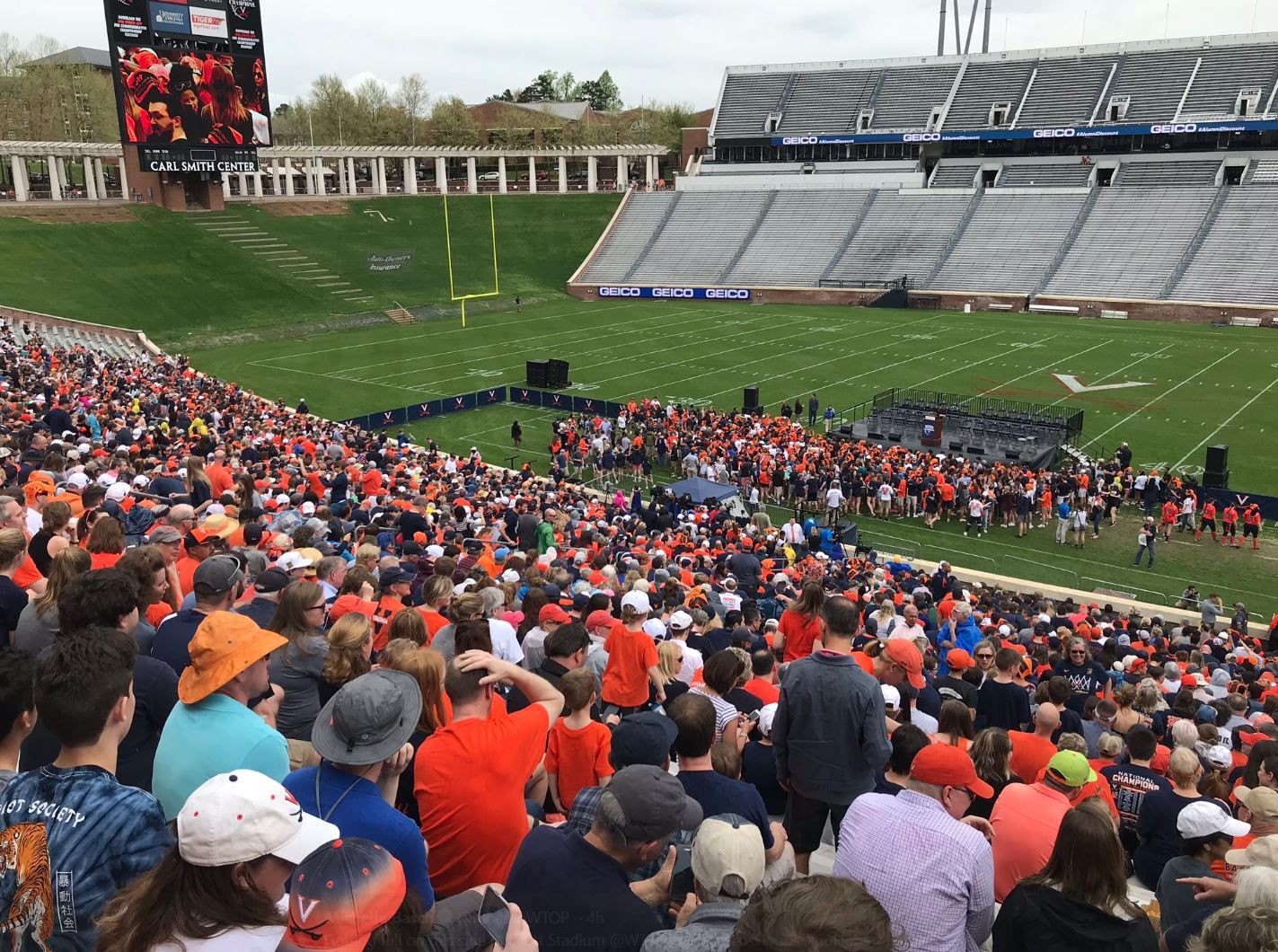 Fans gather at Scott Stadium in Charlottesville, Virginia, on Saturday, April 13, 2019, for a celebration for the men's basketball team. (WTOP/Michelle Basch)