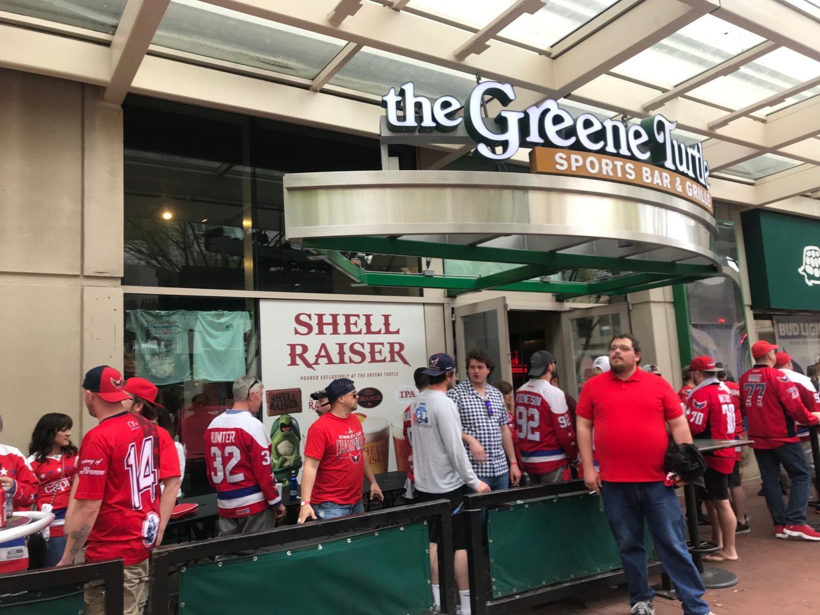 Fans in downtown D.C. celebrate a Caps win against the Carolina Hurricanes. (WTOP/Dick Uliano) 