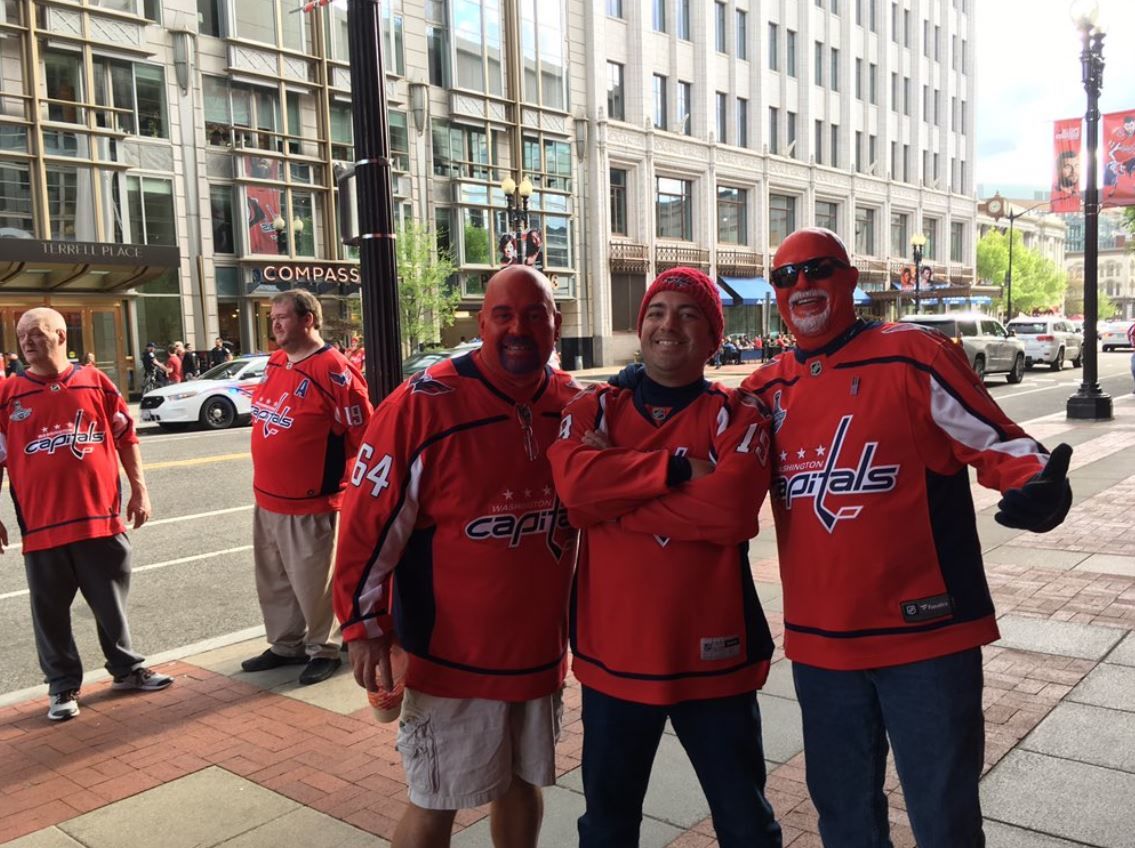 Fans gather outside Capital One Arena before Game 5 between the Washington Capitals and the Carolina Hurricanes on Saturday, April 20, 2019. (WTOP/Liz Anderson)