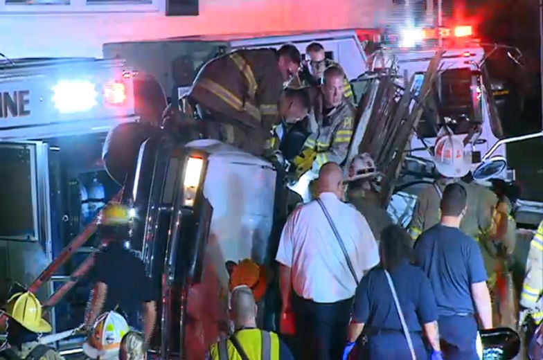 Emergency workers are seen on the scene at the Sheriff Road crash. (Courtesy NBC Washington)