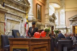 Speaker Pro Tem Adrienne Jones filled in for House Speaker Michael Busch while he was out with pneumonia. He died Sunday, so then Jones had to fill his shoes for the end of the session, declaring the legislative session at an end with the words "sine die." The balloons are a tradition, released from balconies above the Speaker’s lectern. (WTOP/Kate Ryan)