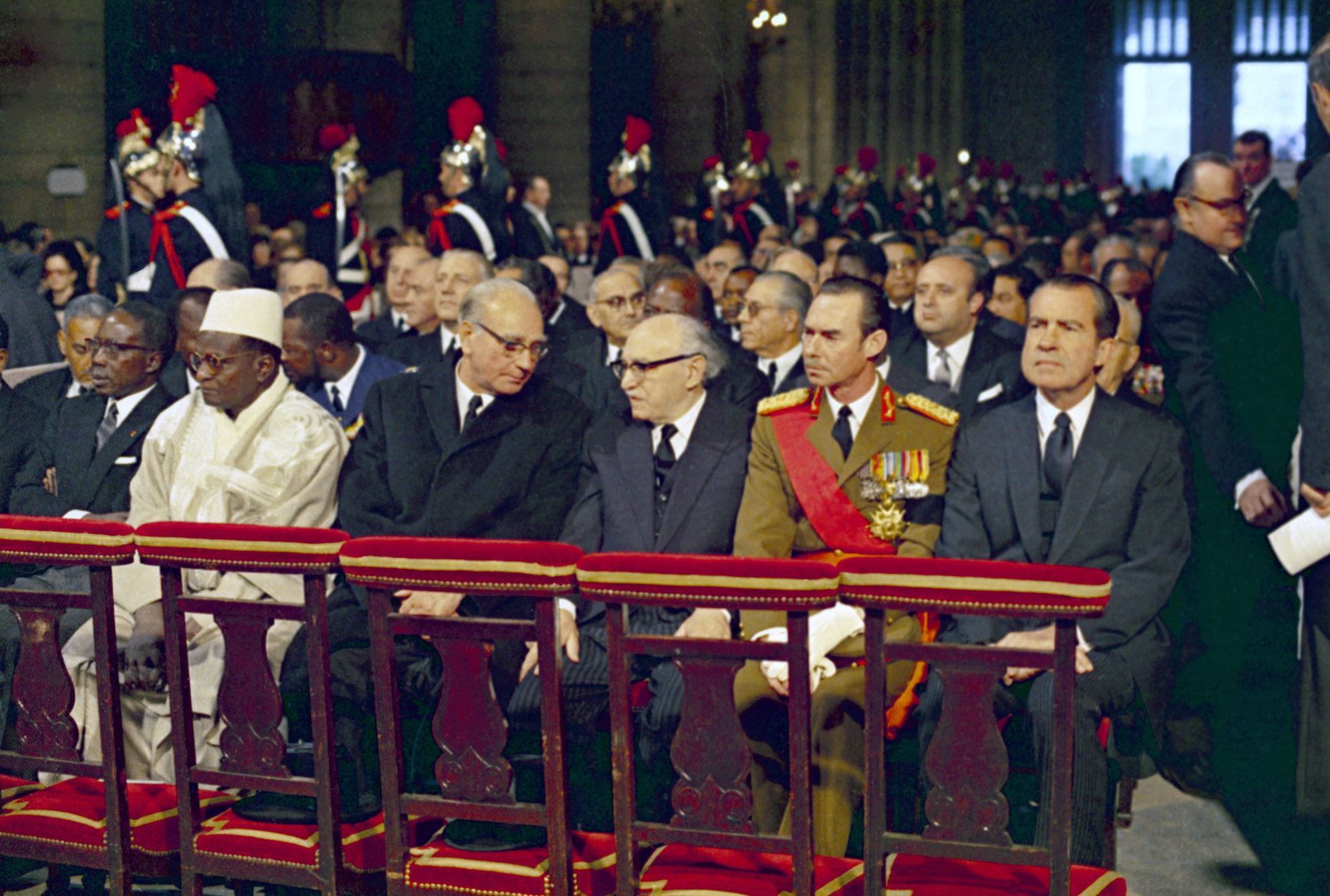 The funeral of former French President Charles De Gaulle at Notre-Dame Cathedral, Paris, France, on Nov. 12, 1970, was attended by many heads of state and members of European Royal families. President of the United States, Richard Nixon, sits right before the start of the service. (AP Photo)