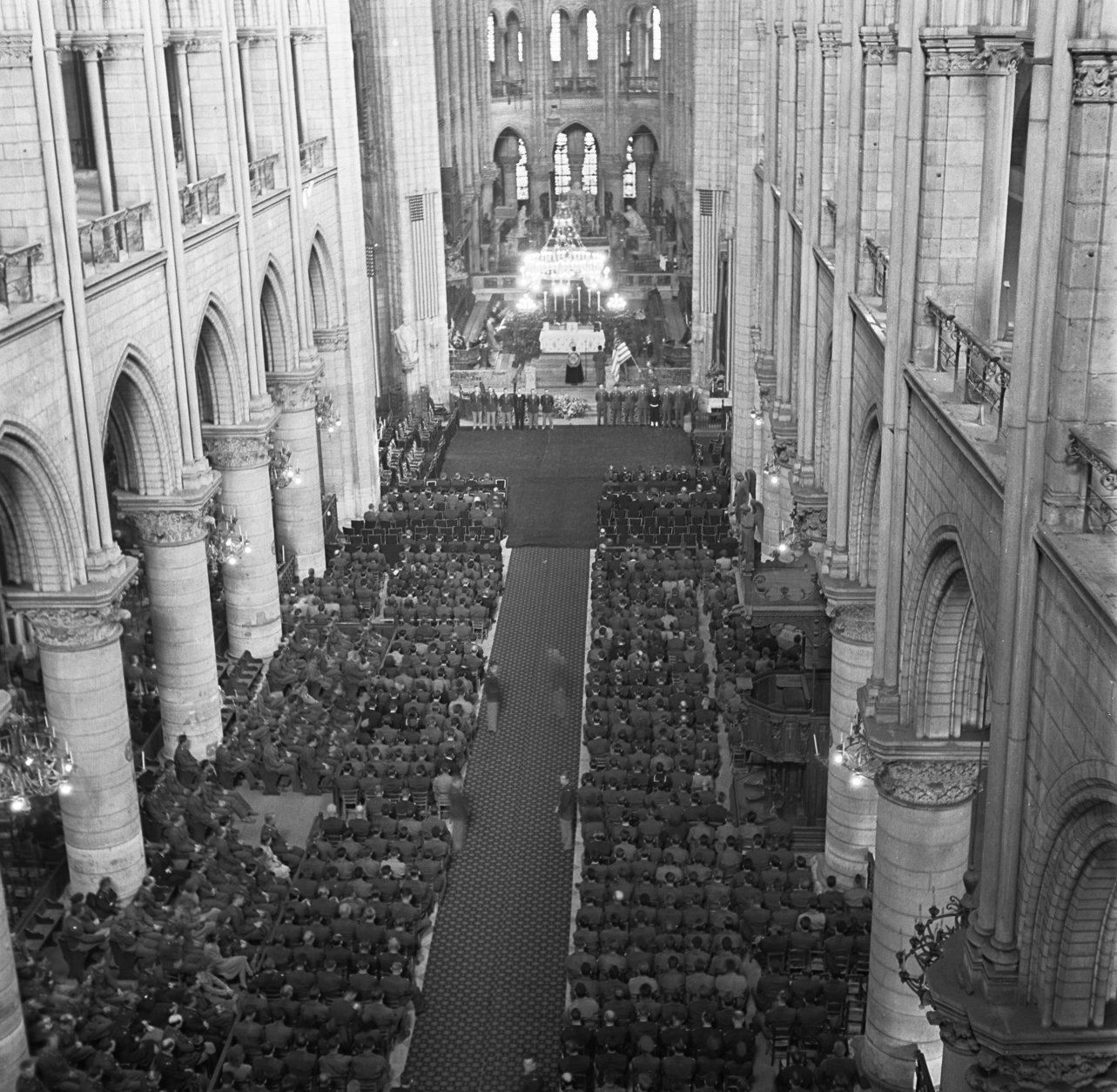 U.S. soldiers fill the pews of Notre Dame Cathedral, Paris, France, April 16, 1945, during the GI memorial service for U.S. President Roosevelt. (AP Photo/Morse)