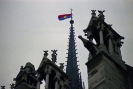 A North Vietnam flag flies from the pinnacle of Notre Dame Cathedral in Paris, France on Jan. 19, 1969 as peace talks on a possible cease-fire in Vietnam had started on previous day. (AP Photo)