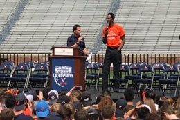 Virginia men's basketball coach Tony Bennett, left, introduces Ralph Sampson, who was part of the team that first made it to the Final Four, during a celebration in Charlottesville on Saturday, April 13, 2019. (WTOP/Michelle Basch)