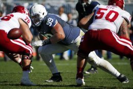 Penn State defensive tackle Austin Johnson (99) comes off the ball against Indiana offensive lineman Wes Martin (76)  during the second half of an NCAA college football game against Indiana in State College, Pa., Saturday, Oct. 10, 2015. Penn State won 29-7. (AP Photo/Gene J. Puskar)