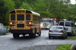 Wires were down on a Prince George's County Public Schools bus on Wellington Street after the storm. The kids were safely held on board as a precaution. (WTOP/Dave Dildine)