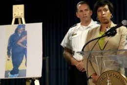 WASHINGTON, DC - MAY 21: Mayor Muriel Bowser (C) of Washington, DC listens as Chief of the Metropolitan Police Department Cathy Lanier (R) speaks at a press conference at police headquarters May 21, 2015 in Washington, DC. Bowser and Lanier asked the public for help in locating a suspect, Daron Dylon Wint, in a quadruple murder in the killing of Savvas Savopoulos and his family. Authorities believe Wint may have traveled to the Brooklyn, New York area. (Photo by Win McNamee/Getty Images)