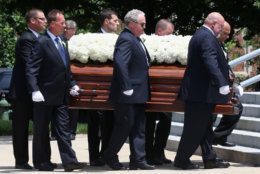 WASHINGTON, DC - JUNE 01: The casket of Savvas Savopoulos is carried during a funeral service at the Saint Sophia Greek Orthodox Cathedral June 1, 2015 in Washington, DC. Darron Dellon Dennis Wint, was arrested for the murders of Savvas Savopoulos, 46, his wife, Amy, 47, and their 10 year old son, Philip along with their housekeeper, Veralicia Figueroa, 57, who was killed with them.  (Photo by Mark Wilson/Getty Images)